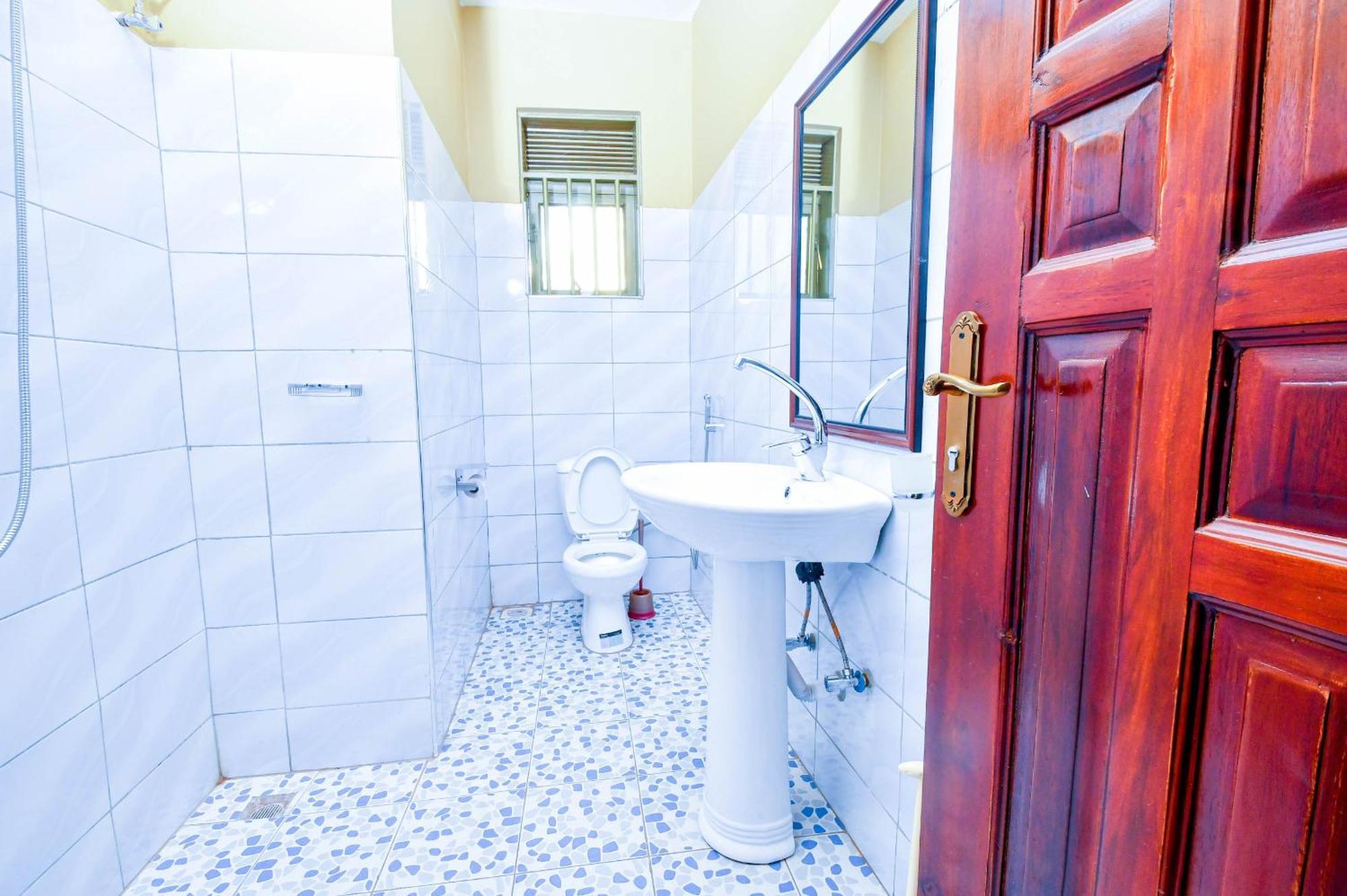 Peace Of Mind Suites Entebbe Esterno foto